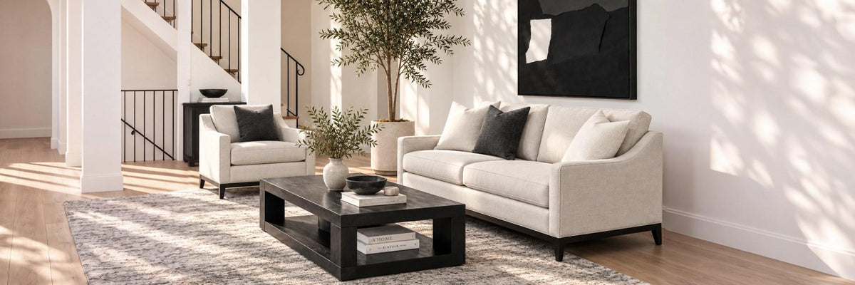 Cream fabric Moran Century sofa and chair in a sunlit living room